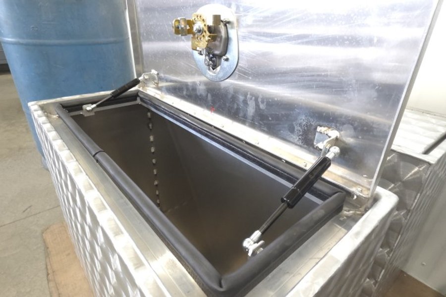 Heavy-duty aluminum truck toolbox mounted on a work truck in Ohio